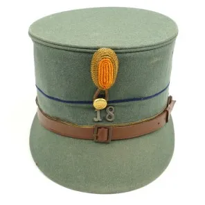 A visor cap for generals of the police, Made of fine police-green gabardine  cloth, dark brown trim band, gold piping. Golden-yellow silk lining (cap  trapezoid is missing), the light brown leather sweatband